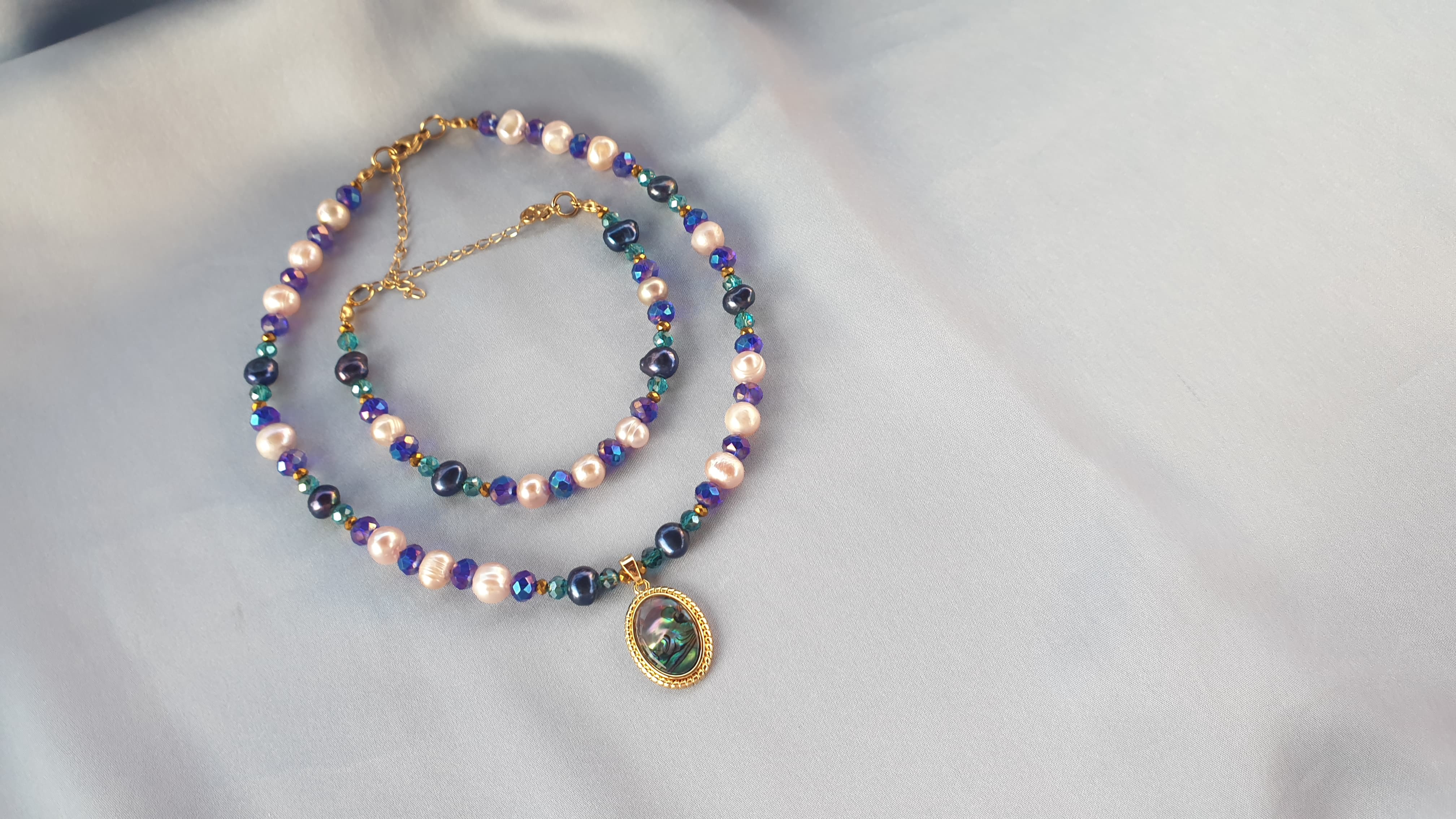 عقد كريستال لؤلؤ وصدف الابالون