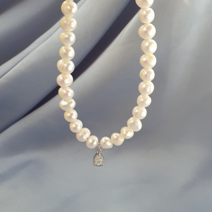 عقد لؤلؤ أبيض وزركون | White pearls & zircon necklace
