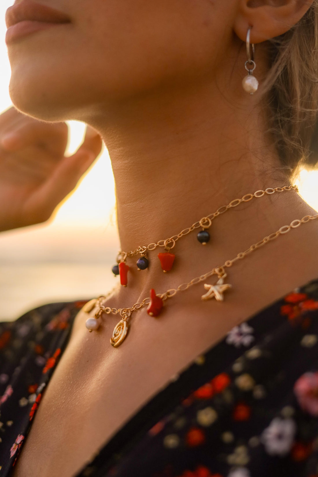 عقد عناق اللؤلؤ والمرجان | Pearl and Coral Embrace Necklace